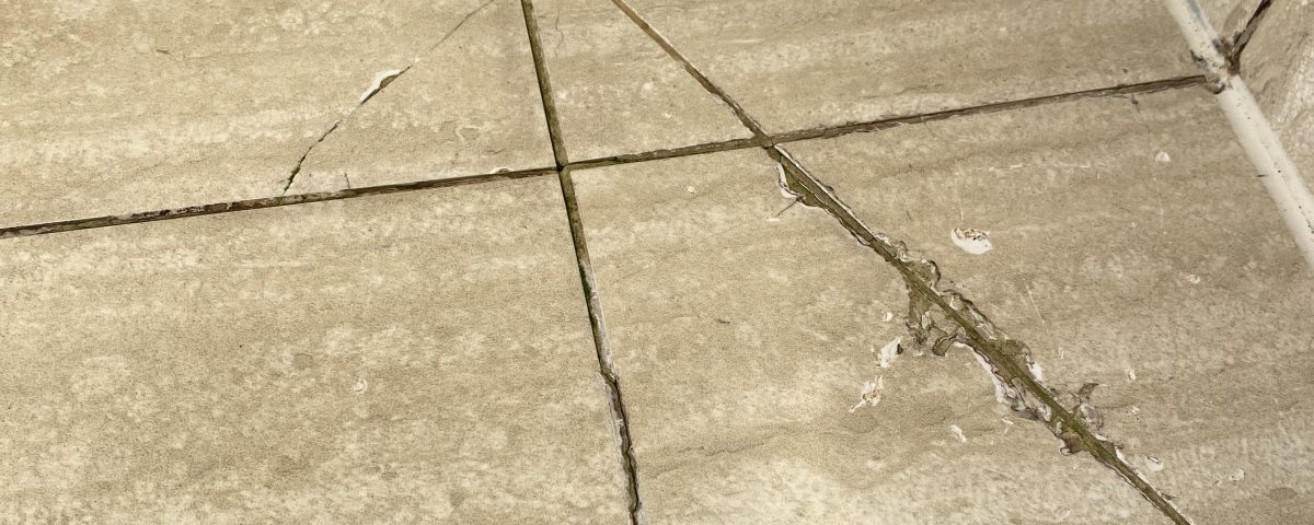 Cracked and shipped tiles in a shower