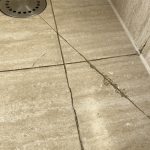 Cracked and shipped tiles in a shower